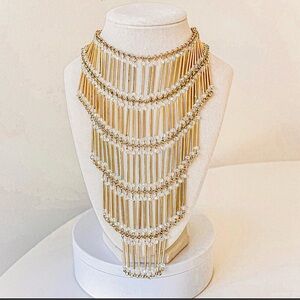 Brand new never worn Egyptian revival gold tone tube bib necklace